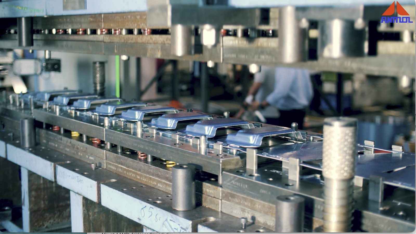 Progressive die producing stamped sheet metal parts on a press line